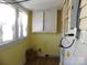 A mud room featuring an electrical panel and a window at 516 W 7Th St, Kannapolis, NC 28081