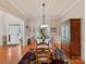 Dining room with beautiful hardwood floors, rug and natural light at 5405 Silver Creek Dr, Waxhaw, NC 28173