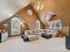 Large bonus room offers comfortable seating, ample light, and multiple windows at 5405 Silver Creek Dr, Waxhaw, NC 28173