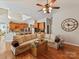Open-concept living room flowing into the kitchen, with a comfortable sectional sofa at 5405 Silver Creek Dr, Waxhaw, NC 28173