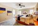 Bedroom with neutral walls, ceiling fan, cozy carpet, and a view from the windows at 7306 Timbercreek Ct, Denver, NC 28037