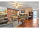 Inviting living room featuring hardwood floors, neutral paint, and comfortable seating for relaxing and entertaining at 8808 Shady Pine Ct, Charlotte, NC 28214