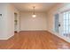 Bright dining area with hardwood floors and french doors at 9128 Kings Canyon Dr, Charlotte, NC 28210
