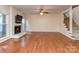 Comfortable living area with hardwood floors, fireplace and staircase at 9128 Kings Canyon Dr, Charlotte, NC 28210