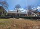 Charming single-story brick home with a well-maintained front yard and mature trees at 105 Brickyard Rd, Fort Mill, SC 29715