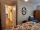 Main bedroom showing open door to hall, wardrobe, and natural light from windows at 105 Brickyard Rd, Fort Mill, SC 29715