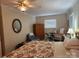 Spacious main bedroom offering a ceiling fan, natural light, and neutral decor at 105 Brickyard Rd, Fort Mill, SC 29715