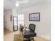Bright home office featuring a desk, chair, and natural light from the window at 10530 Stoneacre Ct, Pineville, NC 28134