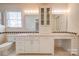 Bathroom features vanity with storage, countertop space, and tiled floors at 11 Heritage Ln, Shelby, NC 28150