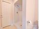 White shower stall with a single shower head and chrome fixtures adjacent to a white door and toilet at 11 Heritage Ln, Shelby, NC 28150