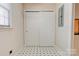 Ample storage is found in this closet with sliding doors and geometric tile floors at 11 Heritage Ln, Shelby, NC 28150
