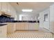 Bright kitchen features white cabinets, blue countertops, and geometric tile flooring at 11 Heritage Ln, Shelby, NC 28150