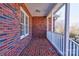 Brick patio with brick columns with a view of a neighborhood at 11 Heritage Ln, Shelby, NC 28150