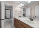 Bathroom includes a double sink vanity with wood cabinets and a framed glass shower at 1114 Roderick Dr, Fort Mill, SC 29708