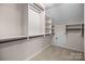 Spacious walk-in closet featuring custom shelving, providing ample storage and organization at 1114 Roderick Dr, Fort Mill, SC 29708