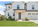 Charming home featuring an inviting covered front porch and a spacious three-car garage at 122 Round Rock Rd, Troutman, NC 28166