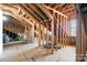 Bright unfinished attic featuring ample natural light and framed walls, offering great potential at 1249 Maddy Ln, Rock Hill, SC 29732
