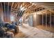 Spacious unfinished attic space with exposed wood beams, ready to be customized to your needs at 1249 Maddy Ln, Rock Hill, SC 29732