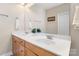 Bright bathroom with double vanity, white countertops, and a large mirror at 1249 Maddy Ln, Rock Hill, SC 29732