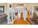 Open-concept foyer leading to a spacious living area with hardwood floors and natural light at 1249 Maddy Ln, Rock Hill, SC 29732