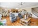 Open-concept living space showcasing the kitchen, dining area, and living room with hardwood floors at 1249 Maddy Ln, Rock Hill, SC 29732
