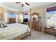 Relaxing main bedroom with tray ceiling, four-poster bed, and ample natural light at 1249 Maddy Ln, Rock Hill, SC 29732