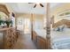 Spacious main bedroom with tray ceiling, four-poster bed, and large dresser at 1249 Maddy Ln, Rock Hill, SC 29732