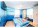 Cozy bedroom with a comfortable bed, closet space, and blue wall art, great for relaxation at 1285 Riverview Dr, Hickory, NC 28602