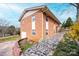 Brick exterior of the house features a convenient side entrance and well-kept surroundings at 1285 Riverview Dr, Hickory, NC 28602