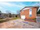 Brick exterior of the home showcasing an attached garage and a clean, paved driveway at 1285 Riverview Dr, Hickory, NC 28602