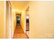 Bright hallway with closet space and access to an appliance area, perfect for a modern home at 1285 Riverview Dr, Hickory, NC 28602