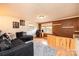 Spacious living area with a comfortable couch, desk and chair perfect for relaxing and working at 1285 Riverview Dr, Hickory, NC 28602