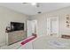 This bedroom features a dresser with a TV and two entryways and a comfortable bedroom suite at 135 Goldenrod Cir, Salisbury, NC 28147