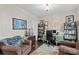 The office space features a desk area, comfortable seating, and ample shelving, perfect for productivity at 135 Goldenrod Cir, Salisbury, NC 28147