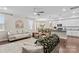 Open-concept living space seamlessly integrates the living room and kitchen, offering a modern design at 135 Goldenrod Cir, Salisbury, NC 28147