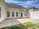 Backyard patio with concrete and small grassy area at 1394 Fitzgerald Nw St, Concord, NC 28027