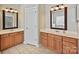 Bathroom showcasing dual vanities, tile floors, and ample cabinet space at 1394 Fitzgerald Nw St, Concord, NC 28027