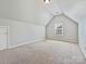 Bedroom featuring a window and carpeted floor at 1394 Fitzgerald Nw St, Concord, NC 28027