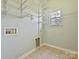 Walk-in pantry with white wire shelving and a tile floor and light-green walls at 1394 Fitzgerald Nw St, Concord, NC 28027