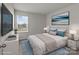 Comfortable bedroom featuring an area rug, a queen bed and a window at 142 S Bell Ave, Albemarle, NC 28001
