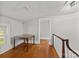 Attic space features wood floors, natural light, and adjacent landing at 14725 N Old Statesville Rd, Huntersville, NC 28078