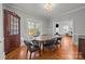Dining room with hardwood floors and view to living room at 14725 N Old Statesville Rd, Huntersville, NC 28078