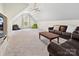Upstairs bonus room with carpeting and a ceiling fan at 15715 Holyhead Ln, Huntersville, NC 28078