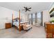 Comfortable bedroom with four poster bed, soft carpet, neutral walls, and a ceiling fan at 158 Country Lake Dr, Mooresville, NC 28115