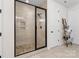 Walk-in shower features tile backsplash, pebble floor, glass door, and shower niche at 158 Country Lake Dr, Mooresville, NC 28115