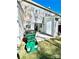 Backyard with a small patio area, outdoor storage, and partial grass at 1754 Pergola Pl, Charlotte, NC 28213