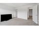 Bedroom with wall-to-wall carpeting, a television and dual doors at 18607 Mainsail Ct, Lancaster, SC 29720