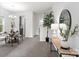 Bright dining room with modern chandelier, a round dining table, and stylish decor at 18607 Mainsail Ct, Lancaster, SC 29720