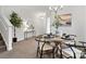 Stylish dining area featuring a modern chandelier and tastefully decorated table at 18607 Mainsail Ct, Lancaster, SC 29720