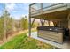 Backyard view featuring a covered hot tub, offering a private relaxation space at 18607 Mainsail Ct, Lancaster, SC 29720